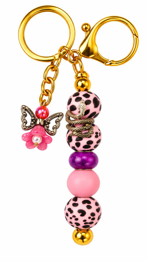 Handmade pink leopard print beaded keychain with snake detail, purple bead, angel charm and gold-tone clasp