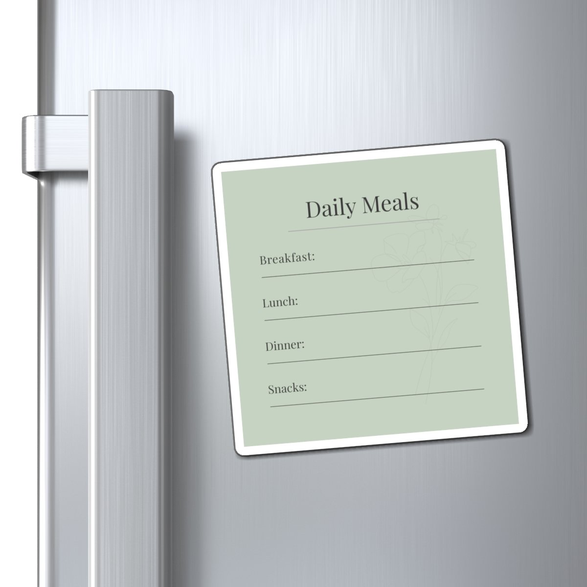 “4×4 soft sage caregiver magnet with botanical accents and writable sections for breakfast, lunch, dinner, and snacks.”