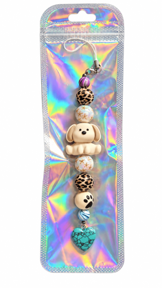 Handmade puppy phone charm with leopard-print beads and turquoise natural stone heart presented in holographic gift packaging