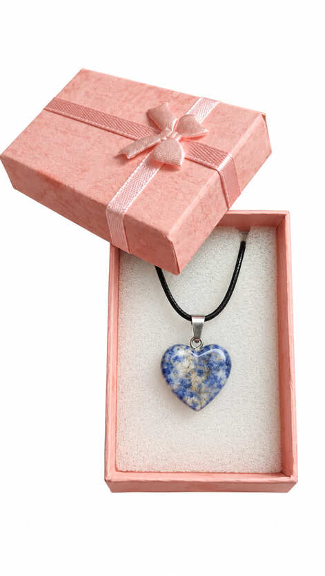 Genuine Sodalite heart necklace presented in an open pink jewellery gift box with satin ribbon bow.