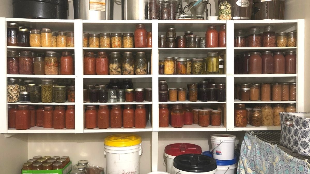 pantry shelves filled with home canned food