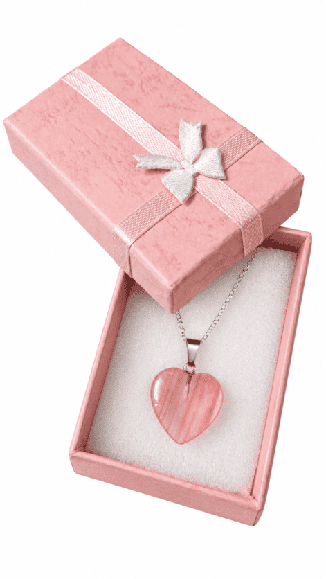 Natural pink crystal heart necklace on a sterling silver chain presented in a pink jewellery gift box.