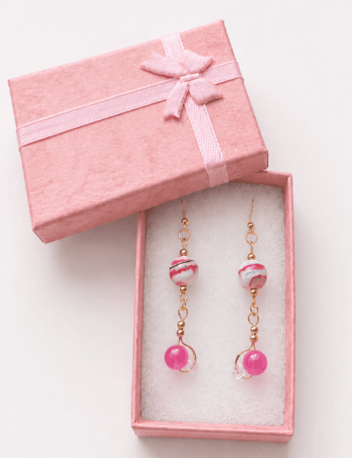 Pink Austrian crystal drop earrings presented in a pink ribbon jewellery gift box