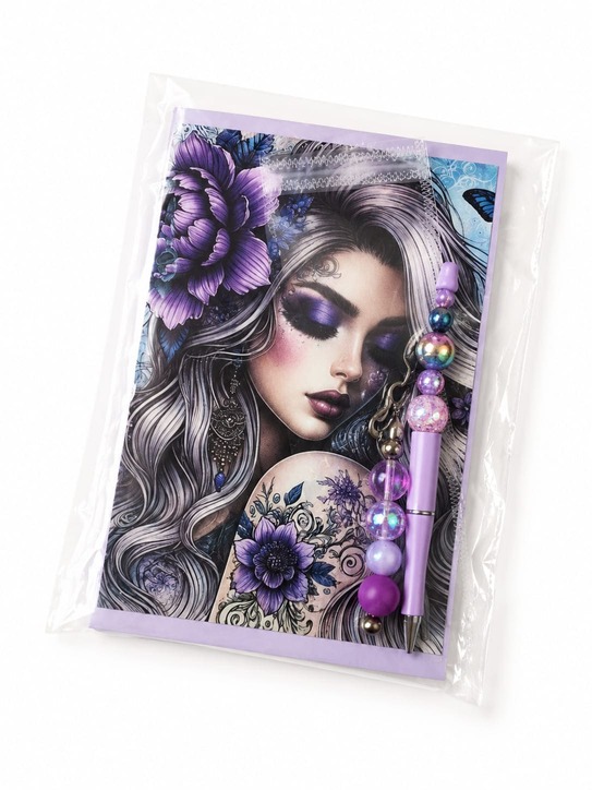 Gothic purple floral notebook and matching beaded pen presented in clear protective packaging