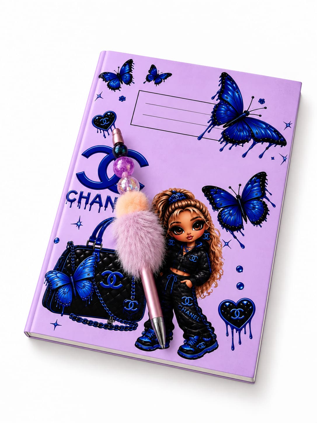 Purple butterfly A5 notebook with coordinating handmade fluffy pink and purple beaded pen on a white background.