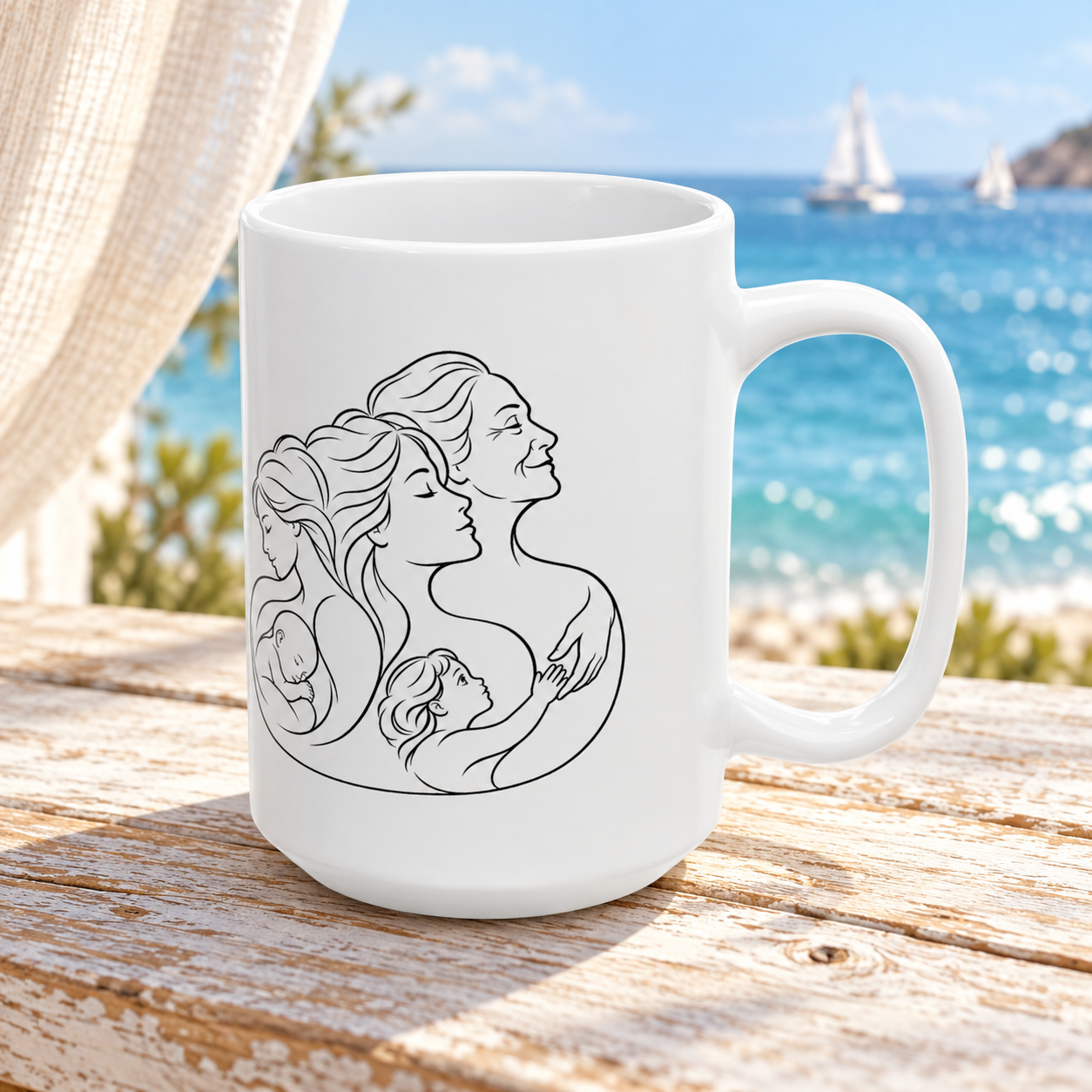 White ceramic mug featuring mother and baby line artwork, on a weathered wooden table overlooking blue water and sailboats.
