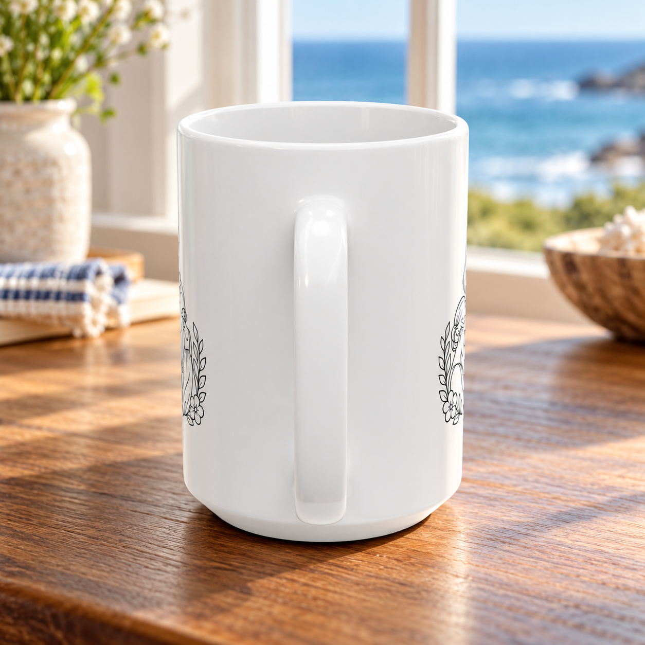 Handle-side view of the white ceramic mug on a wooden table beside a window overlooking the water.