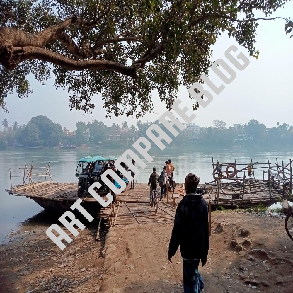 Bamboo Pontoon Ferry Loaded with Blue E-Rickshaws Moored at a Muddy Ghat Under a Large Peepal Tree, as Passengers and Cyclists Board via a Narrow Wooden Ramp