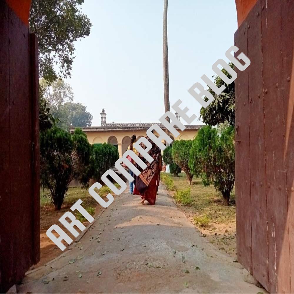 Two Women Tourists Walking Through Gateway Towards Yellow Mosque at Khushbagh - Murshidabad Historical Site