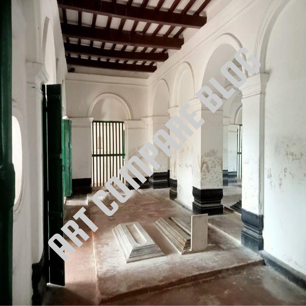 Interior View of White Pillared Mausoleum with Historic Stone Graves and Green Shutters - Khushbagh Tomb Building, Murshidabad