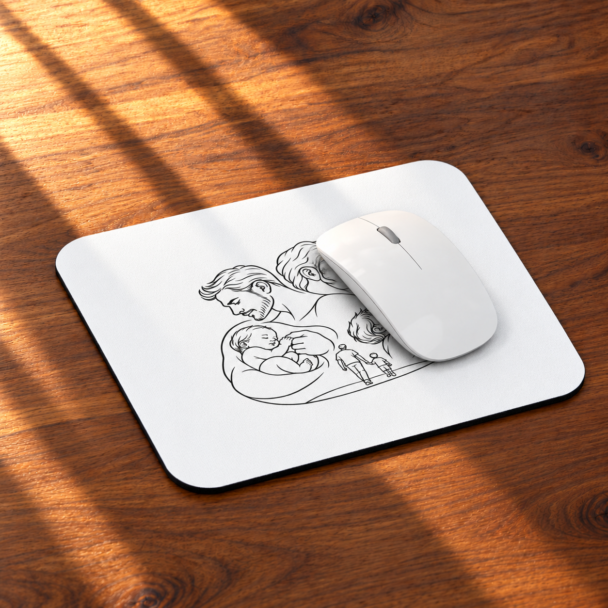 Angled view of the Fatherhood mouse pad on a sunlit wooden desk with a white mouse on the pad.