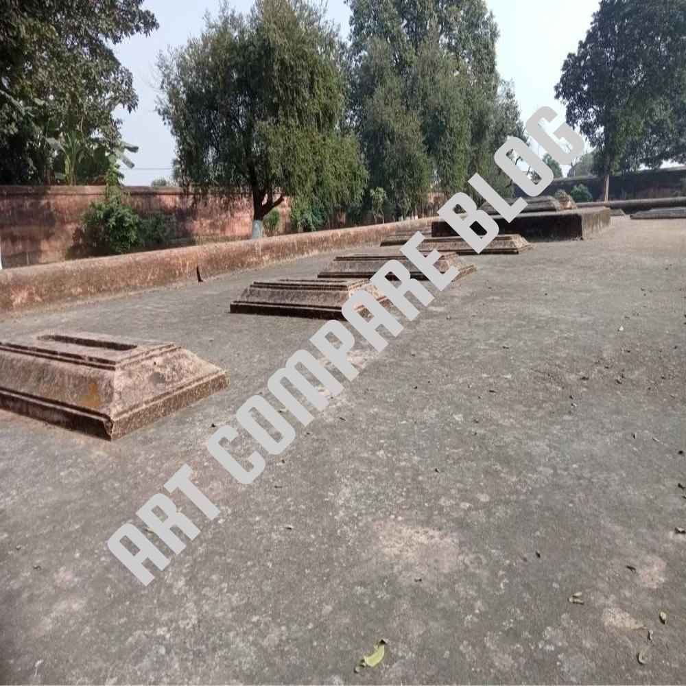 Row of Ancient Stone Graves on Flat Rooftop Terrace with Trees and Brick Boundary Wall - Khushbagh Cemetery Open Graves, Murshidabad