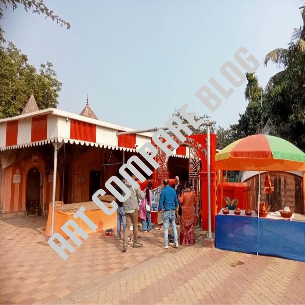 Devotees Entering Red and White Temple Gateway with Religious Stalls Outside - Murshidabad Hindu Temple Main Entrance
