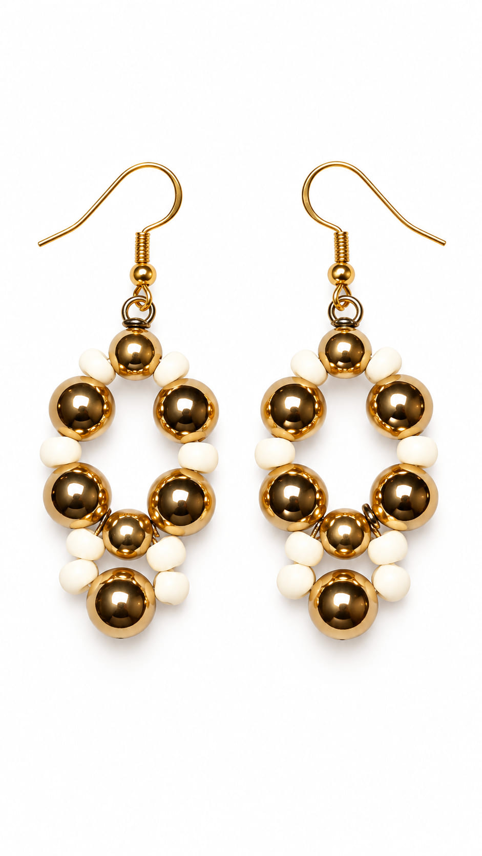 Handmade gold and ivory beaded drop earrings with 18k gold-plated 925 sterling silver ear hooks on a white background.