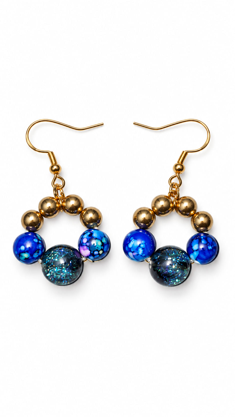 Handmade midnight blue circular beaded drop earrings with gold beads, marbled blue beads and shimmering dark focal beads on 18K gold-plated sterling silver hooks.