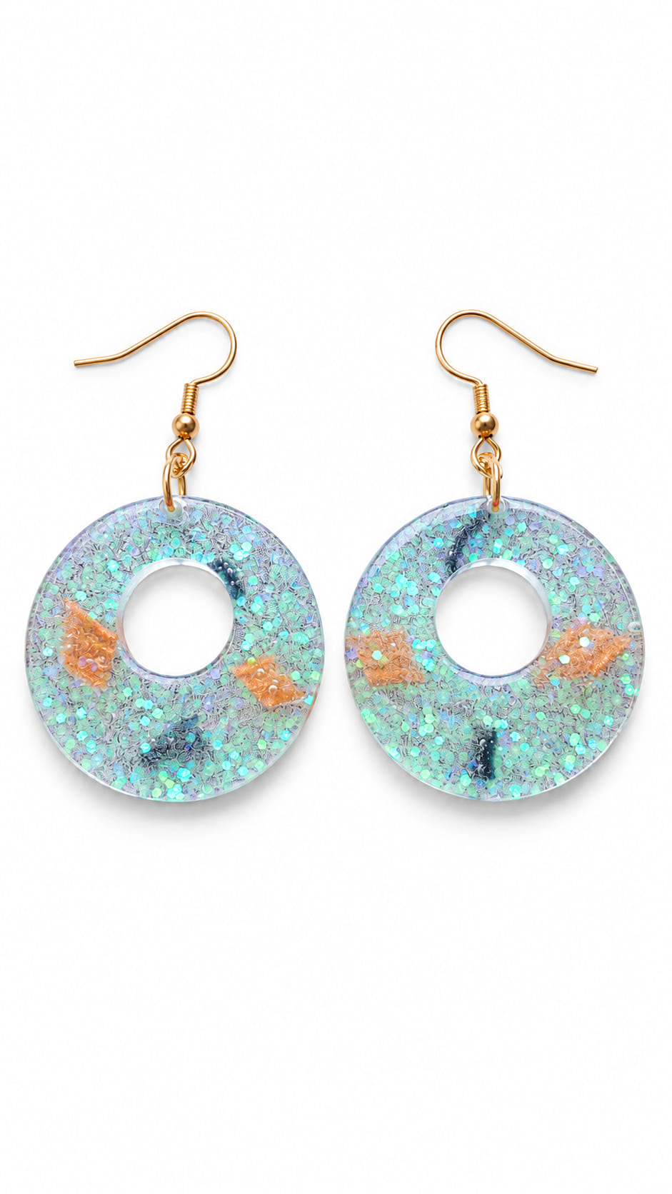 Handmade circular epoxy resin drop earrings with aqua iridescent glitter, peach accents and 18k gold-plated 925 sterling silver ear hooks on a white background.