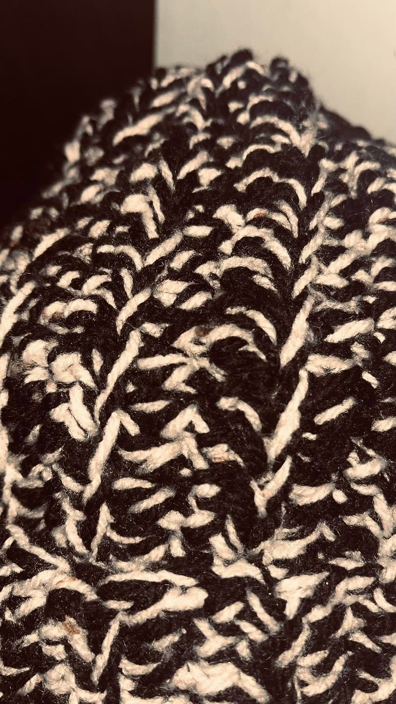 Handmade black and white crochet woolly hat, cosy two-tone winter beanie with an 8 x 9 inch folded measurement.